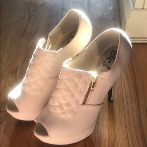 Cream heels with gold zipper